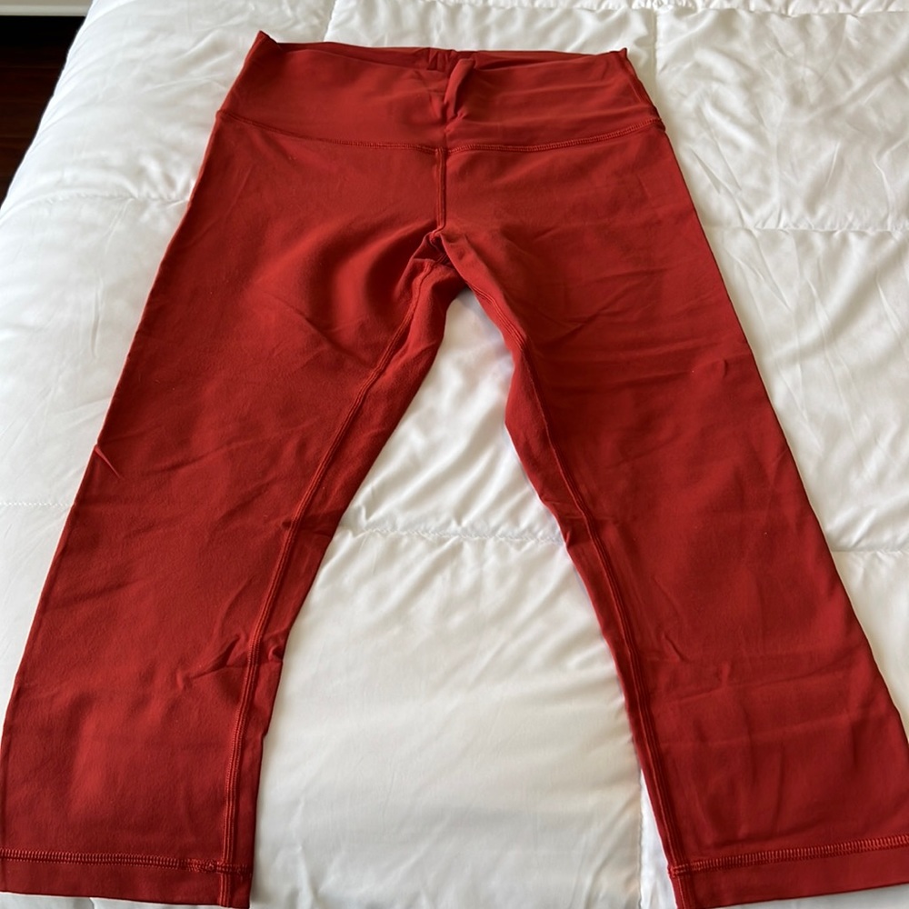 Lululemon size 10 burnt orange colored leggings 21”  thick and warm for winter.